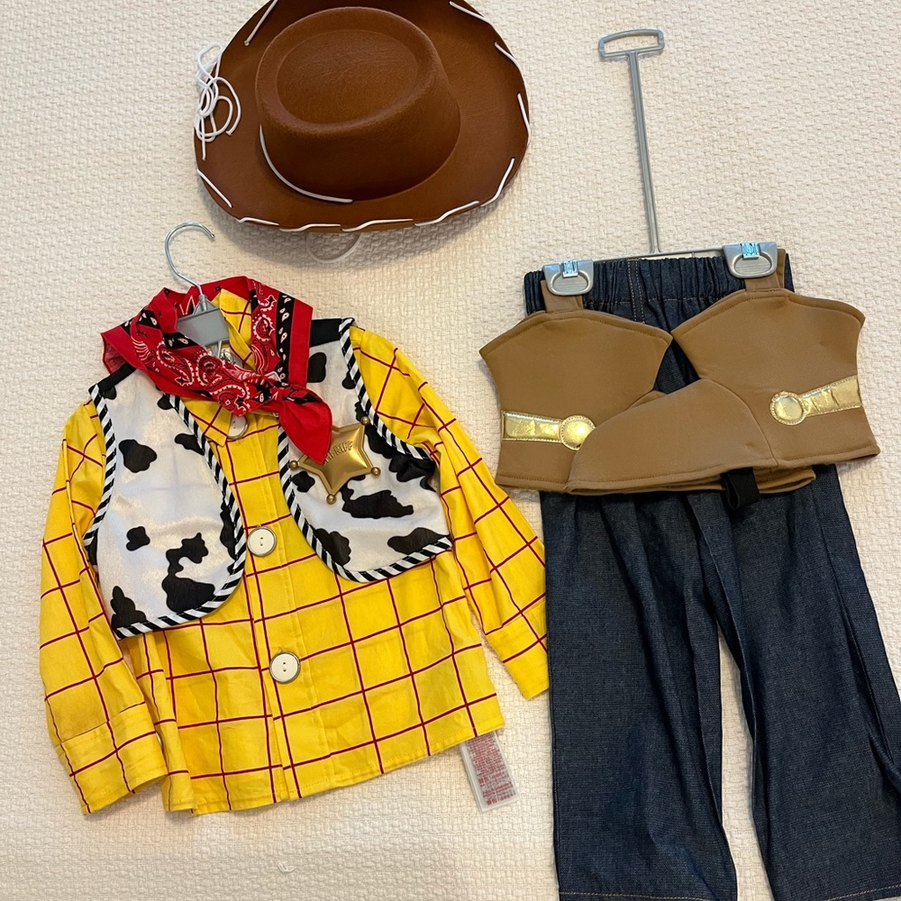 Size 3T Disney woody costume worn once. Excellent condition.
